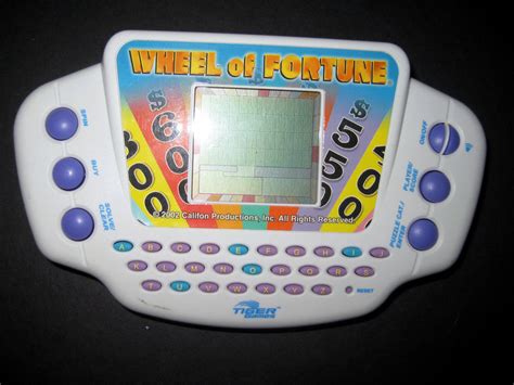 Wheel of fortune handheld game - Wheel of Fortune Game: 6th Edition - Spin The Wheel, Solve A Puzzle, And Win by Pressman. 2,154. 3K+ bought in past month. $1199. List: $24.99. Save 50% on 1 when you buy 2. FREE delivery Wed, Jan 3 on $35 of items shipped by Amazon. More Buying Choices. $11.62 (12 used & new offers) 
